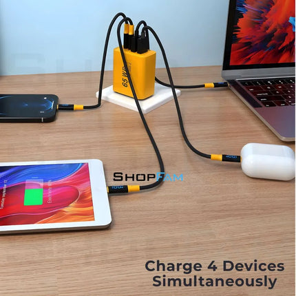 ShopFam 65W USB-C charger plug charging four devices simultaneously